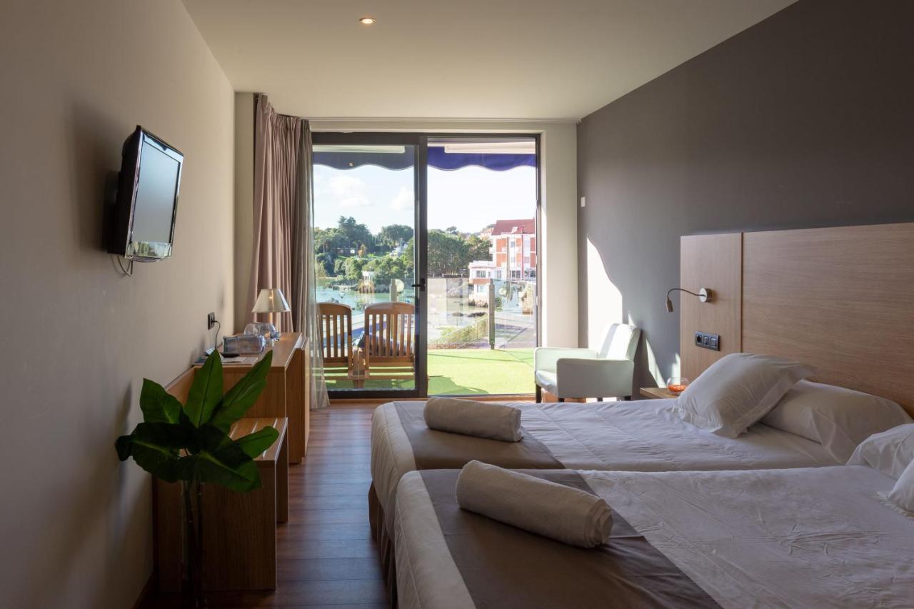 Hotel Astuy Isla Exterior photo