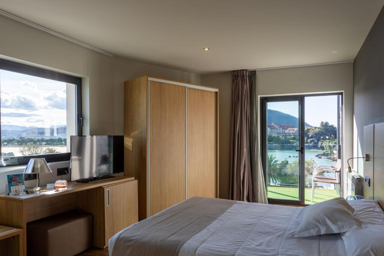 Hotel Astuy Isla Exterior photo